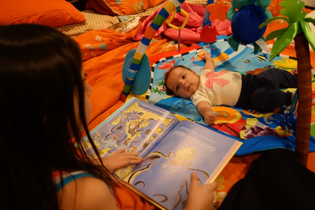 Olivia Reads To Eva